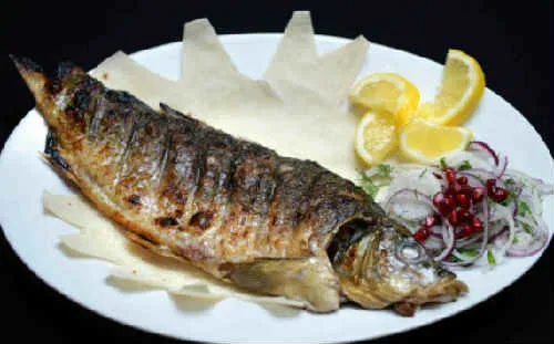 Жареный карп на сковороде